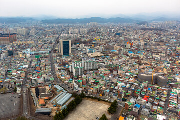 Fototapeta na wymiar Daegu South Korea city skyline buildings from Duryu Park on a cloudy winter day 