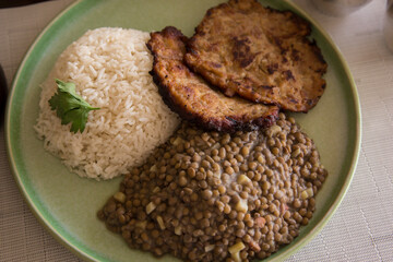 Lentils stew with hamburguer tuna tortilla peruvian gourmet restaurant comfort food