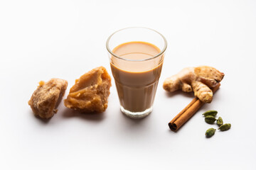 Jaggery tea or Gur ki chai with ingredients like gud, ginger or adrak, green cardamom and cinnamon