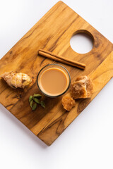 Jaggery tea or Gur ki chai with ingredients like gud, ginger or adrak, green cardamom and cinnamon