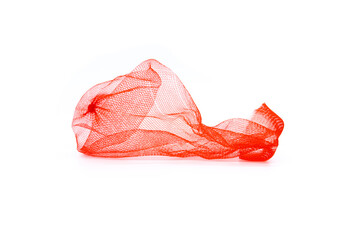 Closeup of red plastic mesh bag isolated on white background