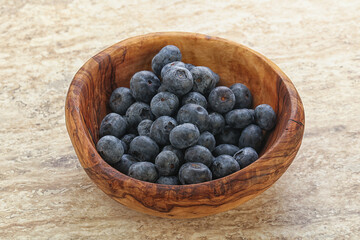 Sweet ripe blueberry heap in the bowl