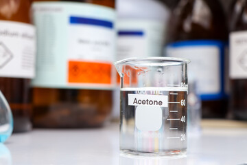 acetone in glass, chemical in the laboratory and industry