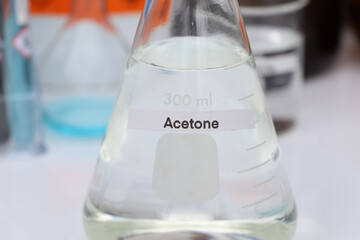 acetone in glass, chemical in the laboratory and industry