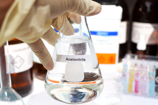 acetonitrile in glass, chemical in the laboratory and industry