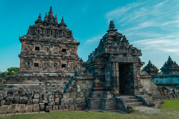 Fototapeta na wymiar Plaosan Temple, a Buddhist temple relic of the ancient Mataram kingdom with a magnificent building and still very clean with a blue sky background