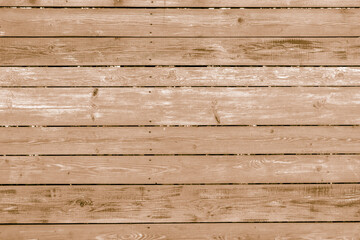 Wall of vintage boards covered with faded paint. Decorative wooden background shabby chic.