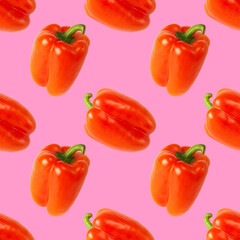 Pattern of fresh red peppers on a pink background