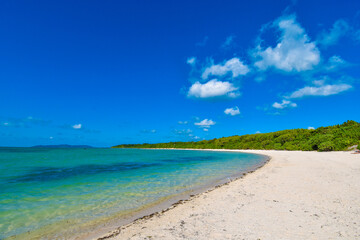 Beautiful tropical beach with white sand and clear blue sky in Taketomi, Ishigaki, Okinawa, Japan