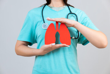 Female doctor holding virtual Lungs in hand. Healthcare hospital service concept stock photo - obrazy, fototapety, plakaty