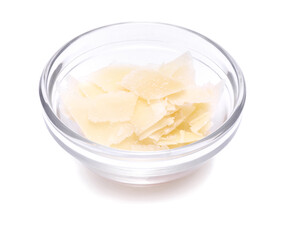 grated Parmesan cheese in glass bowl isolated on white background
