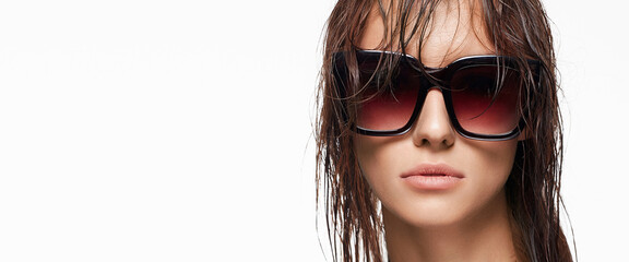 close-up portrait of young woman with Wet Hair and Glasses