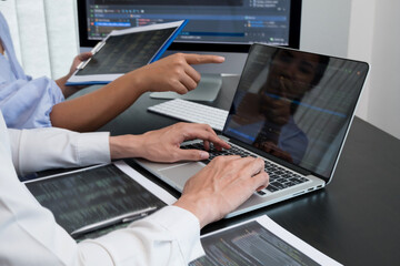 Team of programmers working with computer programming, professional development, and coding technology, working on high-quality visual software development websites