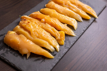 raw chicken fille close up on the kitchen table