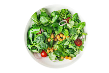 vegetable salad chickpea, legume, lettuce, mache, tomato fresh healthy meal food snack diet on the table copy space food background 