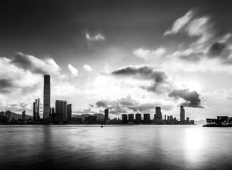 Morning clouds.  Early morning long exposure over Victoria Harbour, Hong Kong with an iPhone and tripod.  In black and white.