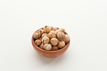 Best cardamom, Siam Cardamom or Kapulaga isolated on white background. Dried seeds, dried herb spice.
