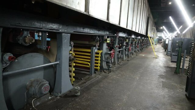 conveyor of a paper machine in the workshop of a paper mill