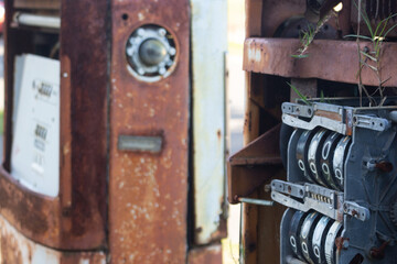 Fototapeta na wymiar two old fuel gas pump rusty