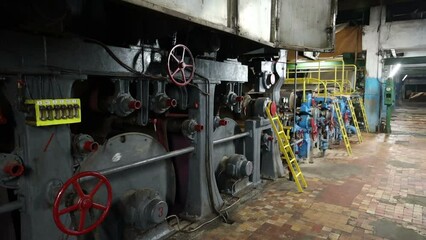 conveyor of a paper machine in the workshop of a paper mill