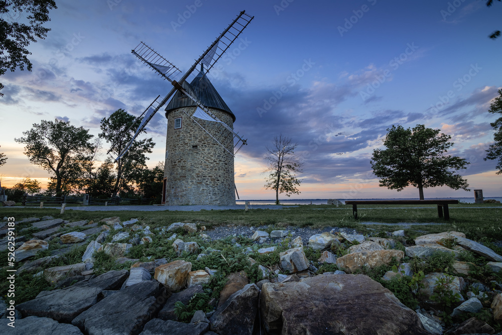 Wall mural old stone windmill with four blades.