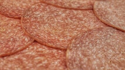 Italian salami with slices cut, close up