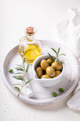 Green and tasty olives with extra virgin olive oil.