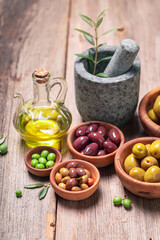Fototapeta na wymiar Tasty and healthy olives as summer Greek preserves.
