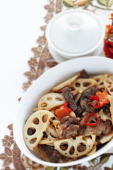 Lotus roots slices stir fried with beef and chili pepper