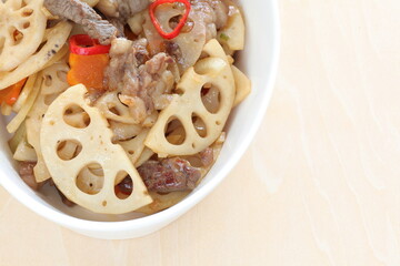 Lotus roots slices stir fried with beef and chili pepper