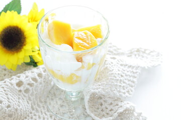 Mango and yogurt dessert for tropical food image