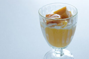 Mango and yogurt dessert for tropical food image