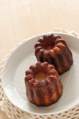 French confectionery, Canelé on dish for gourmet dessert