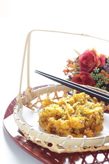 Japanese food, pumpkin tempura in bamboo basket for autumn food image