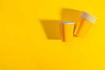 Paper cup or disposable cup made of recycled paper for party. Utensils for branding, empty space to place your brand elements and symbols