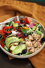Healthy beautiful salad with tuna and avocado. Diet food. Keto salad.