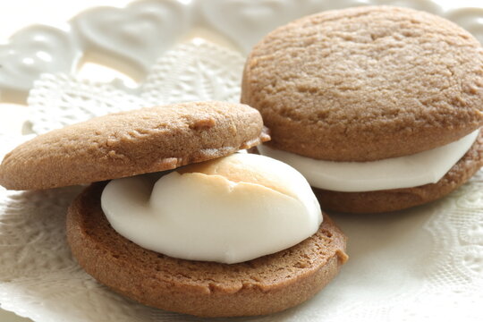 Homemade coffee cookie and marshmallow sandwiches for dessert image