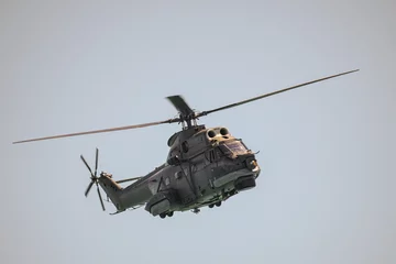 Foto op Plexiglas Flying military helicopter © bizoo_n