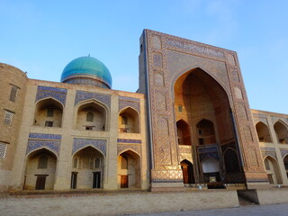 [Uzbekistan] Exterior of Mir i Arab Madrasa in Poi Kalan with blue sky (Bukhara)