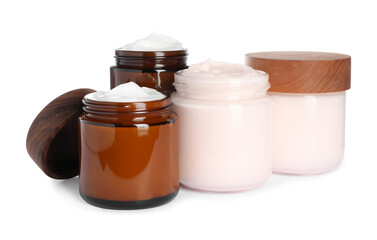 Jars of face cream isolated on white