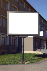 Blank advertising board on city street. Mockup for design