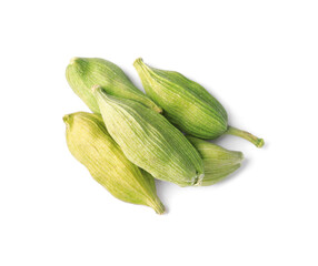 Pile of dry green cardamom on white background, top view