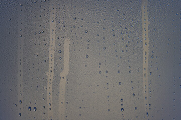 drops glass blue background abstract, transparent cold background water splashes