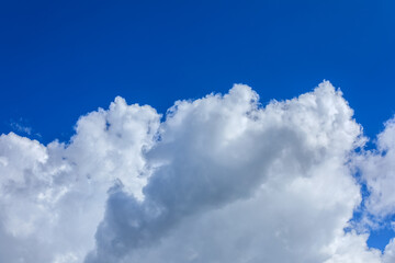 Naklejka na ściany i meble Blue sky and white clouds natural background