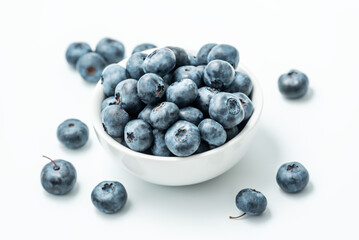 Bowl of fresh Blueberries isolated on white background