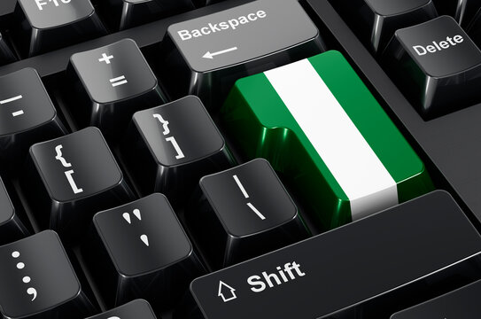 Nigerian flag painted on computer keyboard. Online business, education, shopping in Nigeria concept. 3D rendering