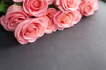 Valentine's Day. Flowers composition on black background. Valentines day background. Flat lay, top view, copy space.
