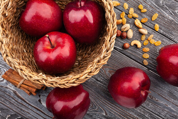 red delicious apple on wood background