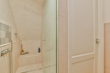 Modern home interior design of white bathroom with open bathtub and shower separated from toilet by...