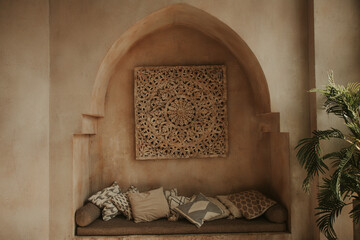 Beautiful interior in oriental style with an arch in the wall